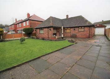 Detached bungalow For Sale in Manchester