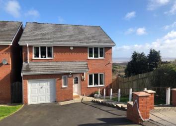 Detached house For Sale in Holywell