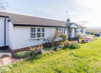 Detached bungalow For Sale in Neston
