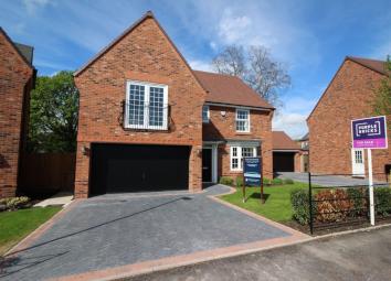 Detached house For Sale in Wilmslow