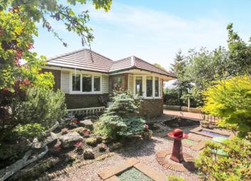 Bungalow For Sale in Wilmslow